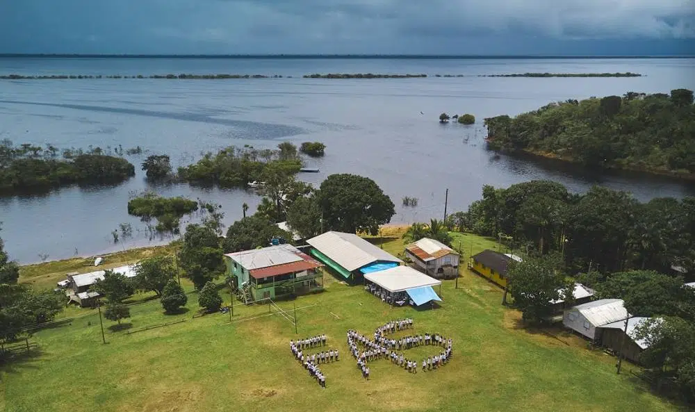Pessoas reunidas na oficina de planejamento e gestão da Fundação Amazônia Sustentável (FAS) no ano de 2022.